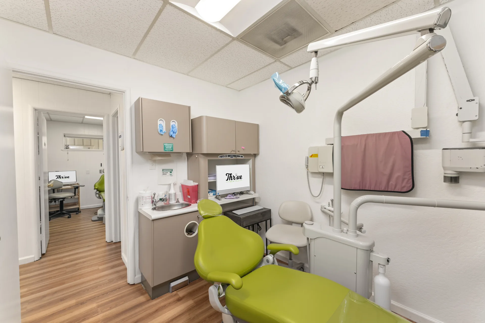 Bright hallway leading to treatment rooms at Thrive Dental Dixon